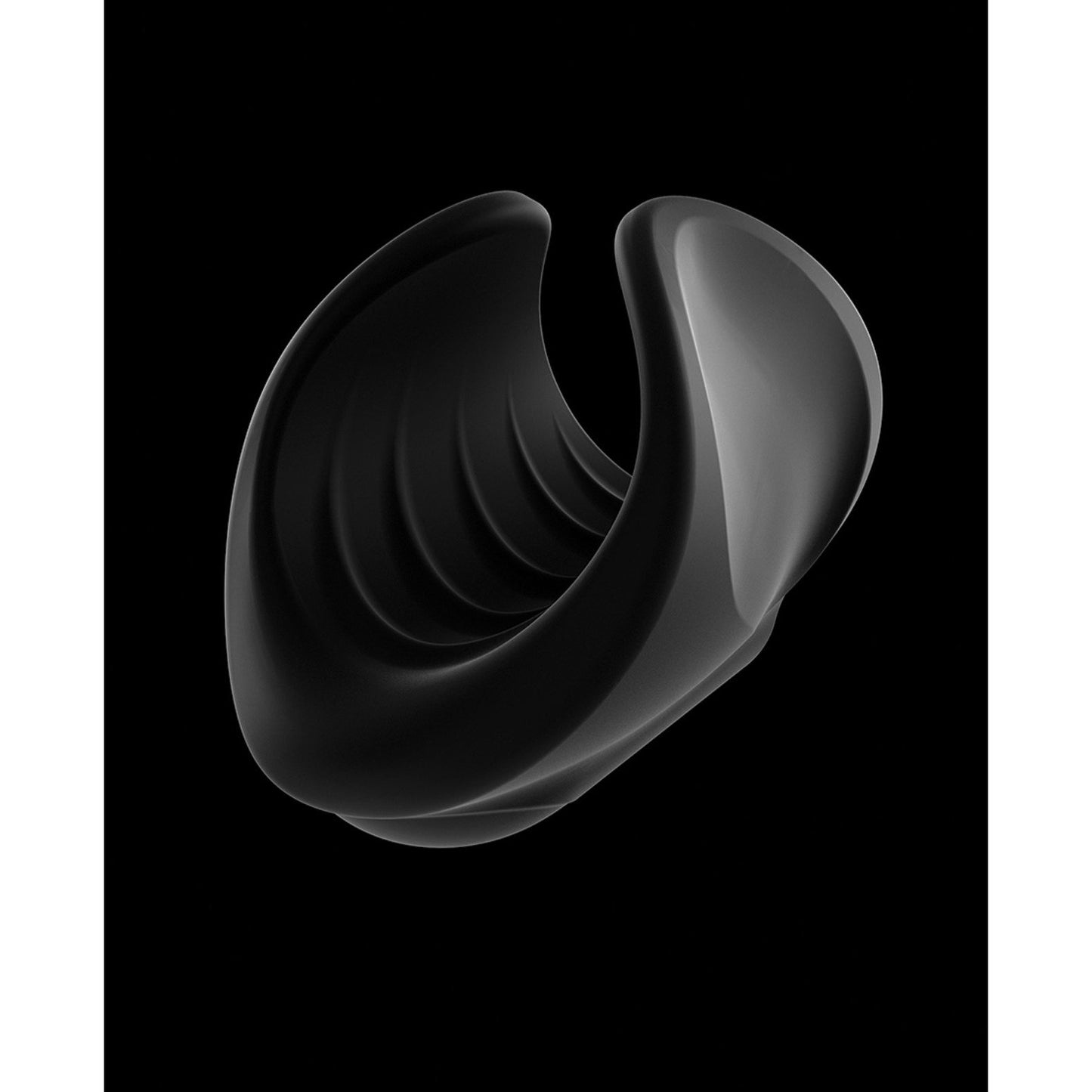 The Man Wand Starter by Adams Toy Box features a black, abstract 3D shape on a black background, resembling a twisted, hollow ring with smooth curves and an inner ribbed texture, crafted meticulously from 100% liquid silicone.