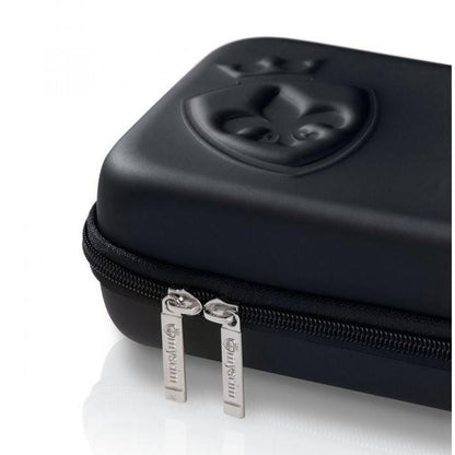 A black, rectangular Mystim Pubic Enemy #2 Cock Cage case with a dual zipper and embossed emblem on top, ideal for discreetly storing unique accessories like an e-stim jolt device.