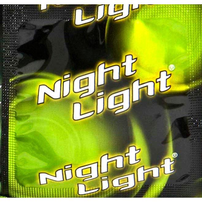 Close-up of a Night Light Glow in the Dark Condom - Box of 3 with a dark background and bright yellow-green accents, featuring premium latex condoms designed to glow in the dark.