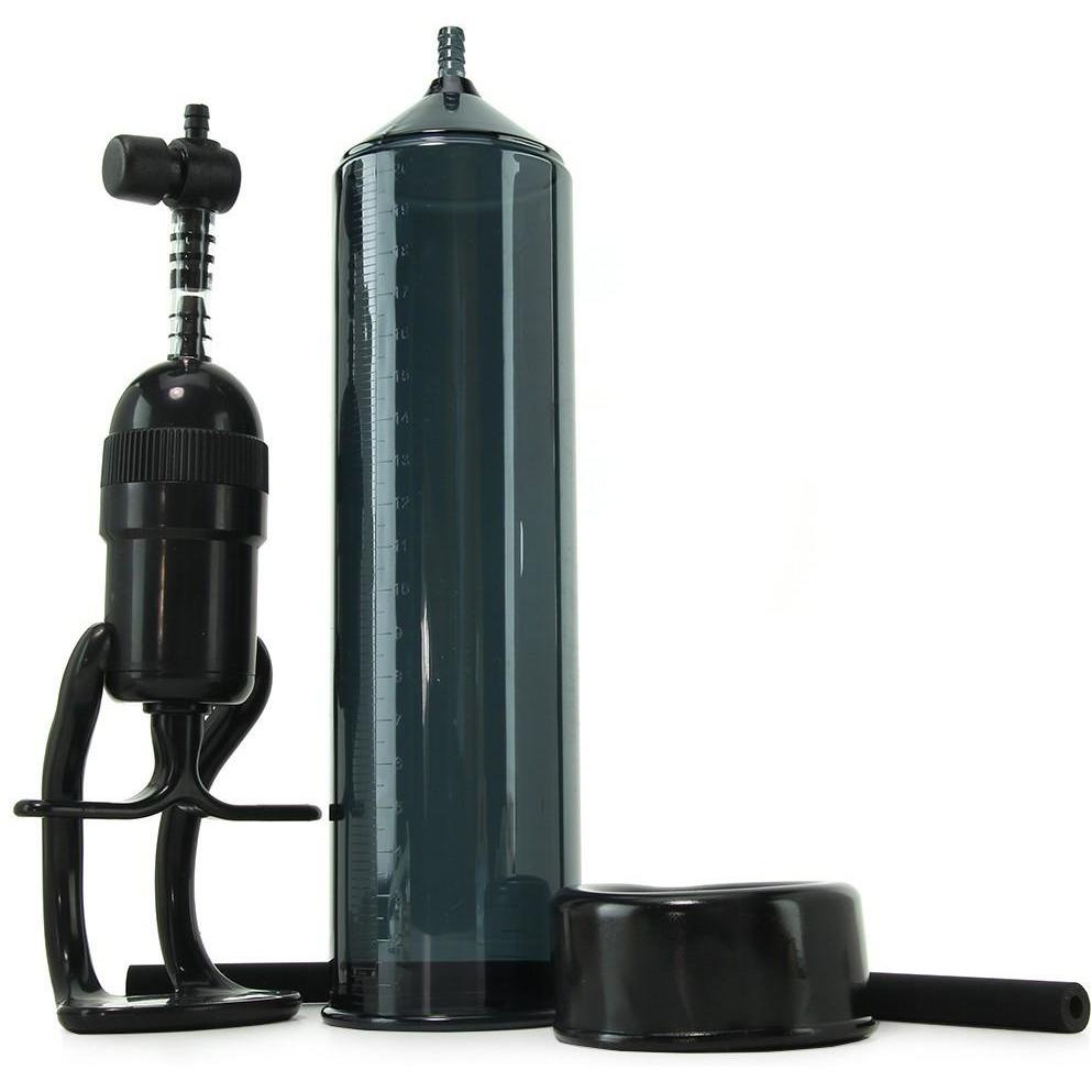 The NS Novelties Renegade Bolero Penis Pump features a transparent cylinder design with an attached pressure gauge. It includes a black handle with connector, an elastomeric sleeve for one-handed pumping, and a separate black cap.