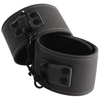 Check out NS Novelties Renegade Bondage Wrist Cuffs—made from cruelty-free leather-look material. These cuffs are linked by a black chain, adorned with silver stitching, and equipped with large metal loops and sturdy clasps for gentle restraint during soft fetish sessions.