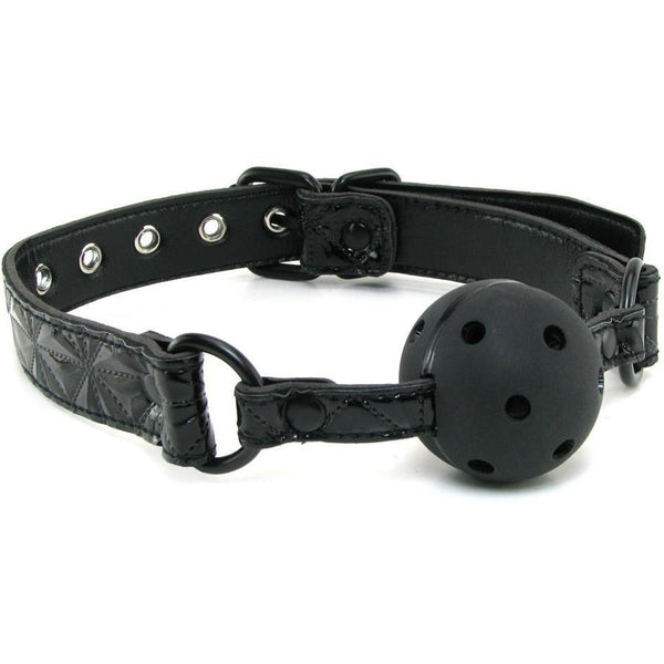 Explore the NS Novelties Sinful Ball Gag with a quilted strap and adjustable metal buckle in sleek black. The soft neoprene ball features small airflow holes for comfort during use.