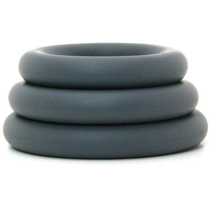 A tapering tower of Adams Toy Box OptiMale C Ring Kit Thick cock rings in dark gray super stretchy silicone, featuring three matte-finished rings of varying sizes for long-lasting erections, set against a white background.