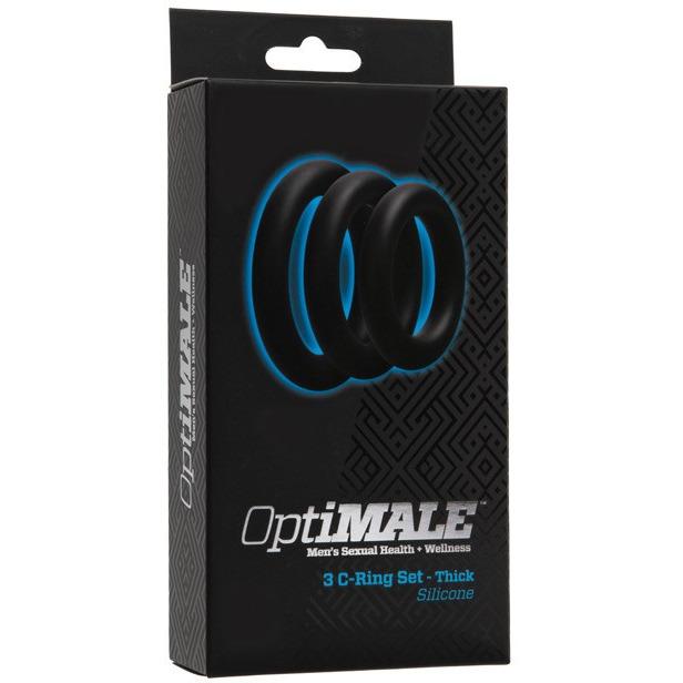 The OptiMale C Ring Kit Thick by Adams Toy Box is expertly crafted with super stretchy silicone for mens sexual wellness. The packaging features three black cock rings against a sleek black and gray geometric pattern, promoting long-lasting erections.