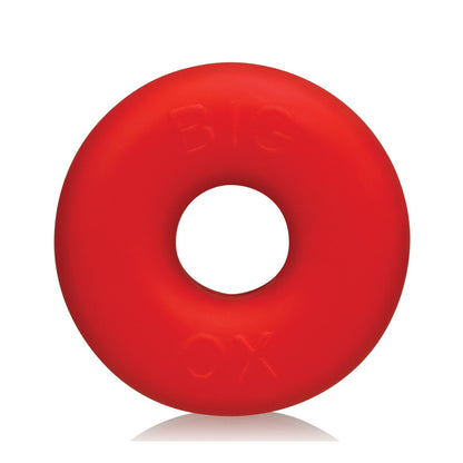 Set against a plain white background, the Oxballs Big Ox Cockring is red and circular with a central hole, featuring BIG and O embossed on its surface.
