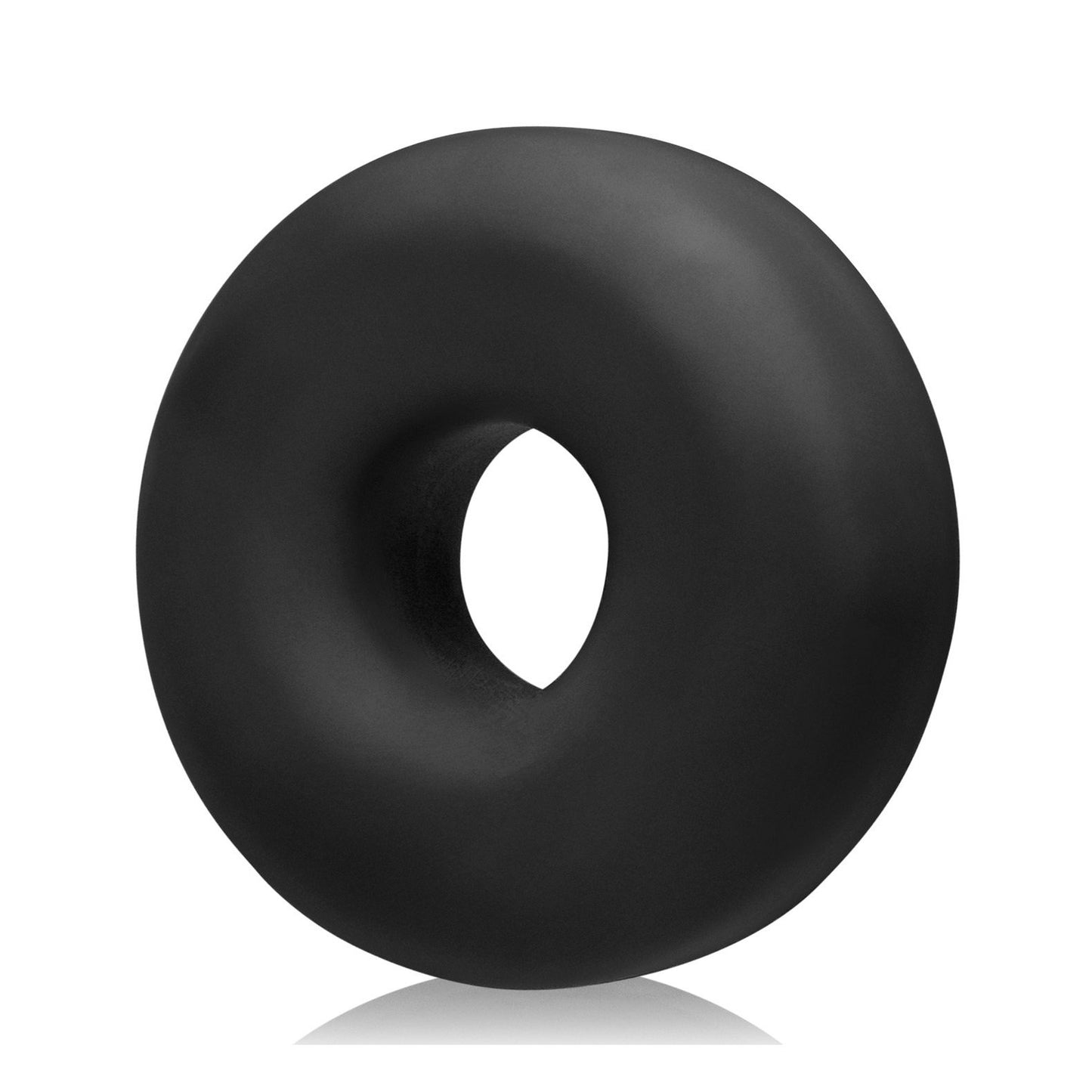 A smooth, matte black torus resembling the Oxballs Big Ox Cockring by Oxballs is centered on a white background, casting a subtle shadow.