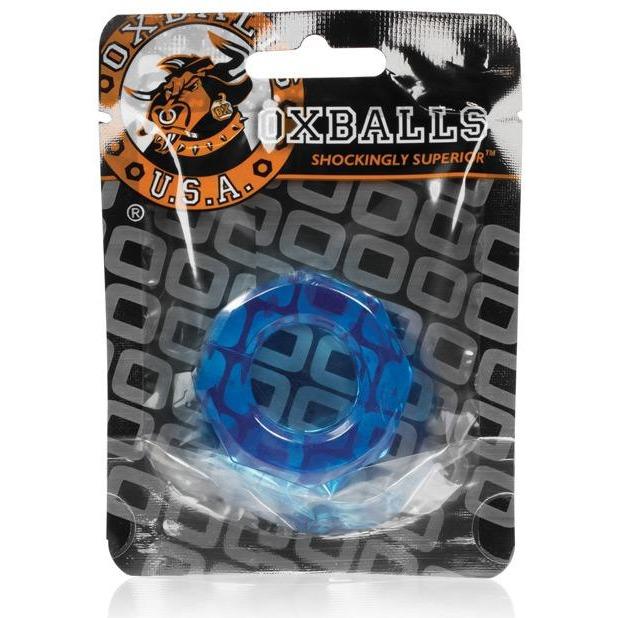 The image shows a clear package containing the Oxballs HUMPBALLS Cock Ring in blue, featuring branding like the stylized bull logo and SHOCKINGLY SUPERIOR. Made from body-safe Skinflex TPR, it prioritizes safety and comfort.