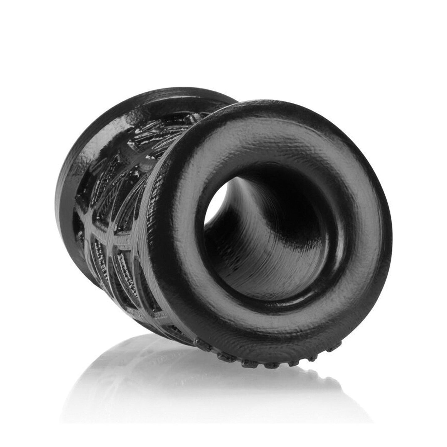A close-up of a black cylindrical tunnel plug with an intricate, web-like design showcases the glossy silicone texture. This hollow centerpiece, set against a white background, captures the artistry of an Oxballs Morph Ball Stretcher.