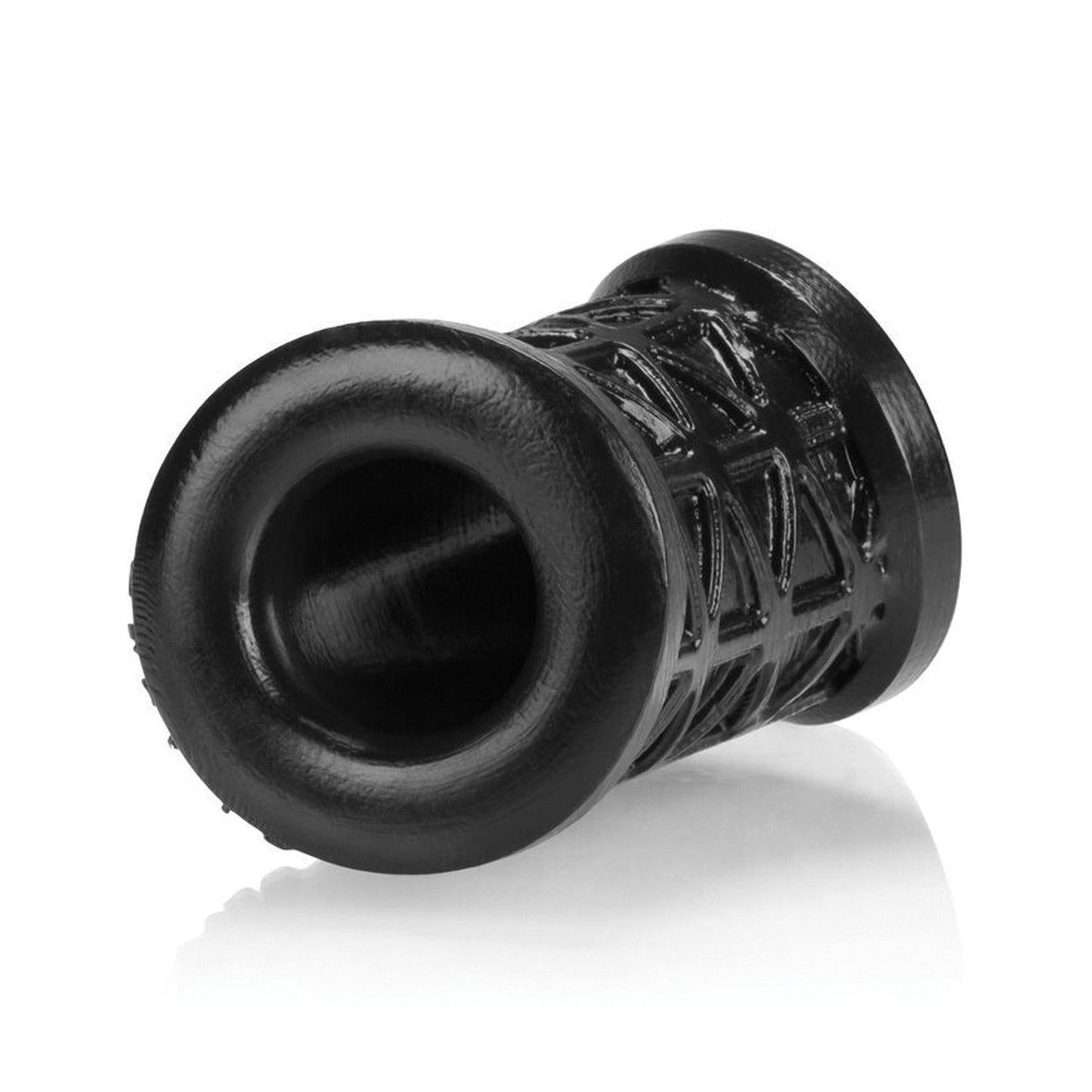 A glossy black cylindrical mesh ferrule with a solid circular base and intricate lattice design rests on a white surface, evoking the modern industrial look of the Oxballs Morph Ball Stretcher by Oxballs, and offering a silicone-like sensation.