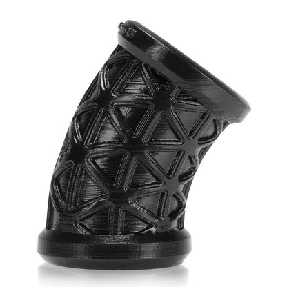 This 3D-printed black plastic object mirrors the sleek design of the Oxballs Morph Ball Stretcher, featuring a tilted cylindrical shape with geometric cut-out patterns. Its hollow form and sturdy base accentuate intricate details and smooth surfaces, evoking a unique aesthetic akin to silicone sensation.