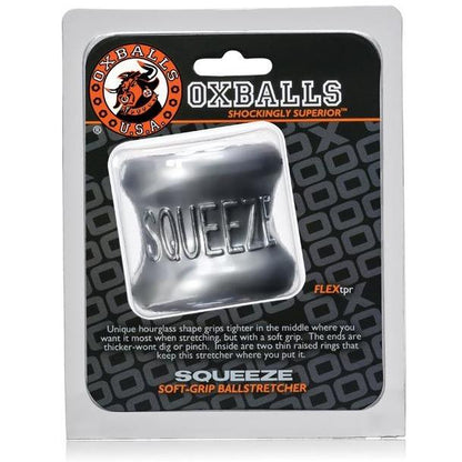 The packaging of the Oxballs Squeeze Ball Stretcher features a gray, hourglass-shaped item with ergonomic design, labeled SQUEEZE. It emphasizes its Flex-TPR material and includes attractive branding and key product features.