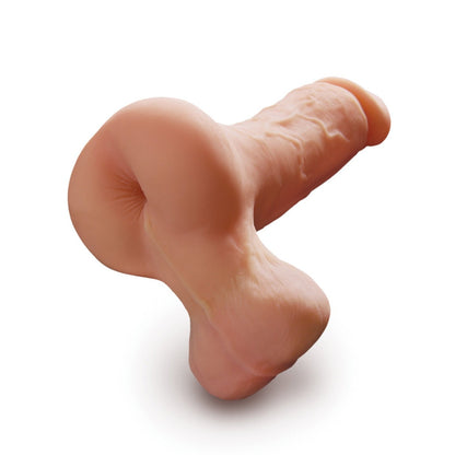 A realistic silicone model of a genital organ with detailed texture and color resembles the PDX Male Reach Around Stroker by PDX, designed for educational or novelty purposes, set against a plain white background.
