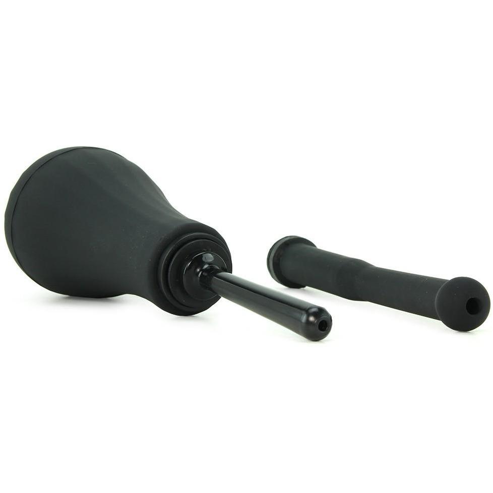 Image of the Perfect Fit Ergoflo Director Enema, featuring a black rubber bulb syringe with a medical-grade silicone nozzle, set against a white background. Ideal for liquid suction and release as an anal douche, with the extended nozzle positioned beside it.