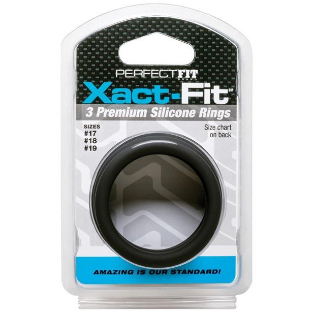 The Perfect Fit Xact Fit 3 Ring Kit packaging, shown in black with the slogan Amazing is our standard!, features size #17, #18, and #19 premium silicone rings for longer-lasting erections. A ring is visible through the transparent front.