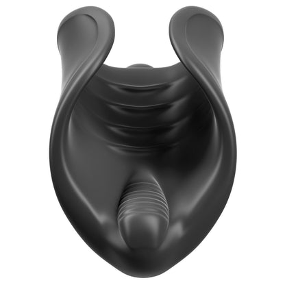 The Pipedream Extreme Elite Vibrating Silicone Stimulator, by Pipedream, is a black U-shaped object with ribbed details and smooth contours. Made of body-safe matte material, it resembles a modern sculpture and has a textured interior for added allure.