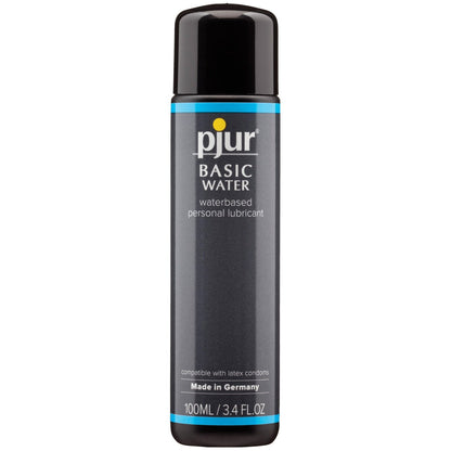 A black cylindrical 100ml bottle of Pjur Basic Water Based Lubricant, featuring a blue and black label. Made in Germany with medical-grade ingredients, its non-allergenic and latex condom compatible.