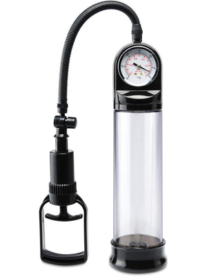The Pipedream Pump Worx Accu-Meter Power Pump is a black vacuum pump with a clear cylindrical chamber, flexible tube, and top-mounted pressure gauge. It includes a hand pump with grip handle for efficient use.