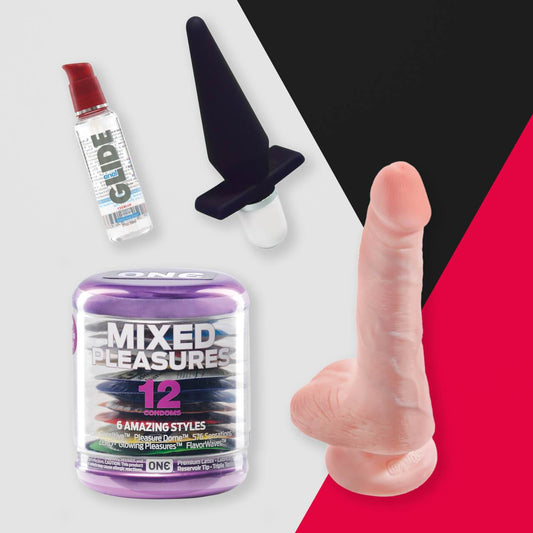 The Sex Toy Virgin collection by Adams Toy Box features intimate items like a bottle of silicone lubricant, a small black plug with a white base, and a Mixed Pleasures container with 12 condoms, set against a background in black, white, and red for added intrigue.