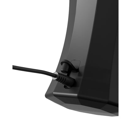 Close-up of the Sir Richards Control Silicone Twin Turbo Stroker, a black electronic device with a power cable connected to a side port under a small flap. Its sleek, modern design and smooth edges suggest its use as an advanced masturbation aid.