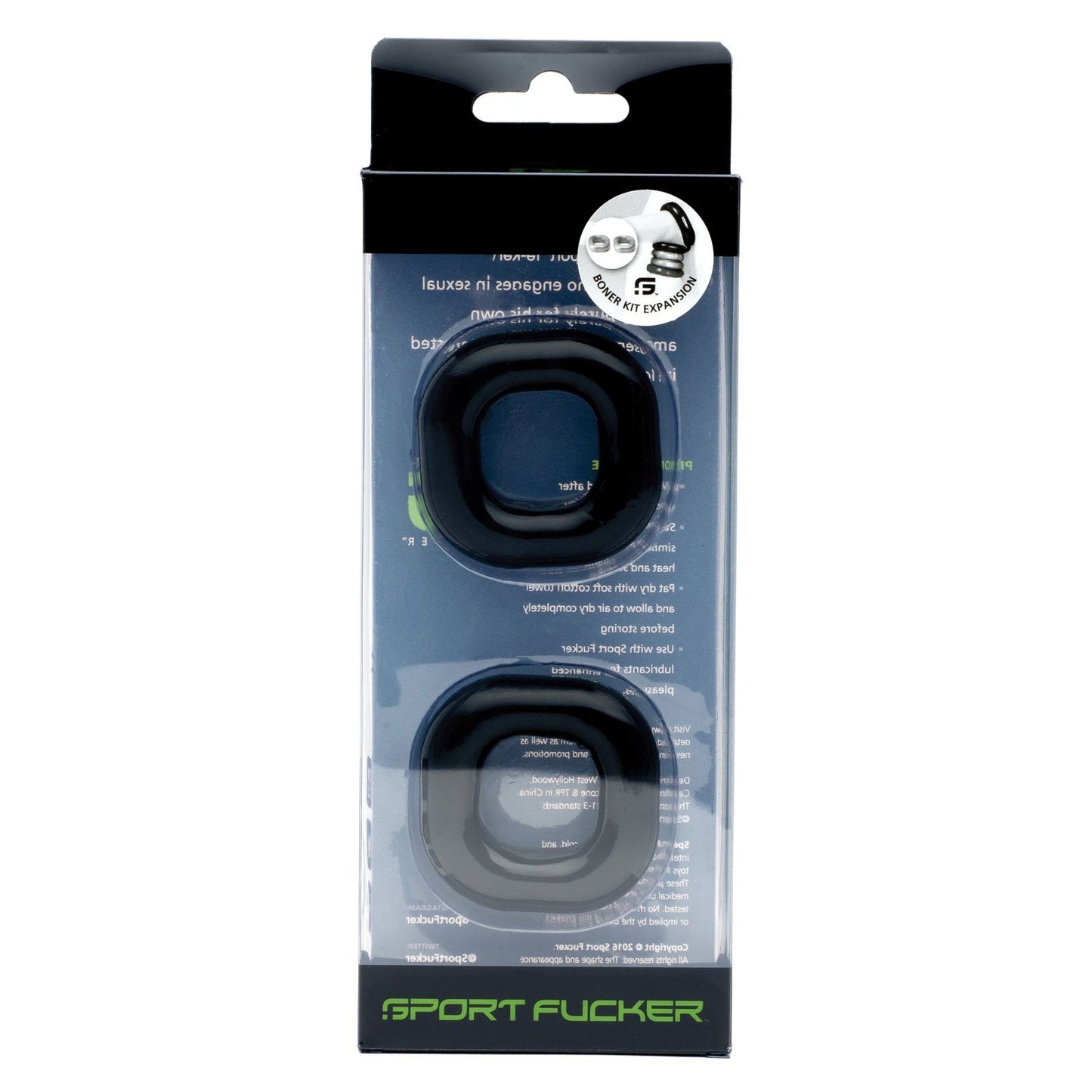 The Sport Fucker Boner Expansion Kit includes two black silicone c-rings in a clear plastic box with bold black and green branding. These super stretchy rings enhance versatility, perfect for enhancing your experience.