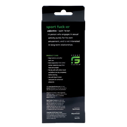 The image displays a stylish black rectangular package for the Sport Fucker Boner Expansion Kit, showcasing care instructions and brand details. Featuring white and green text on a dark background, it promotes the super stretchy c-rings included in the kit.
