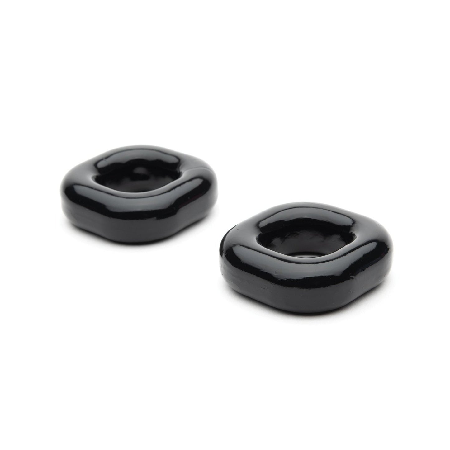 Two sleek, modern black ceramic rings with a square-rounded shape rest on a plain white background, reminiscent of the elegant Sport Fucker Boner Expansion Kit.