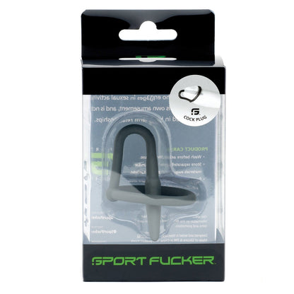 The Sport Fucker Cock Plug, crafted from medical-grade silicone, comes in clear packaging with Sport Fucker at the bottom. It features white and green text and a small circular window displaying the black cock plug, perfect for those interested in sounding.