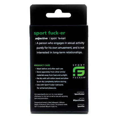The image shows a black box for the Sport Fucker Cum Plug Kit, featuring a playful brand name definition and care instructions. Made from medical-grade silicone, the packaging also includes social media handles and emphasizes the brands California heritage.