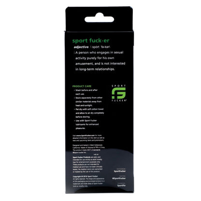 The Sport Fucker Epic Hard On Kit comes in black packaging with Sport Fucker prominently displayed, featuring a humorous definition and care instructions. Made of pure silicone, its unique oval design offers quality and comfort. Social media handles are listed at the bottom.