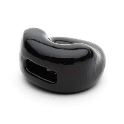 A close-up of the Sport Fucker Half Pipe, a sleek black ceramic ring by Sport Fucker with a modern curved design and dual elongated openings, is shown on a plain white background, embodying the essence of a sophisticated bulge enhancer.