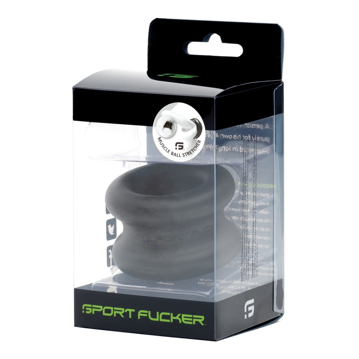 The packaged Sport Fucker Muscle Ball Stretcher, a black soft silicone product by Sport Fucker, is visible through its transparent packaging. Branding and text embellish the sides, showcasing the stretchy C-ring inside.