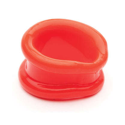 The item is a small, red, flexible, glossy Sport Fucker Slinger Ring with a round, hollow center and smooth edges, designed with a wide band shape.
