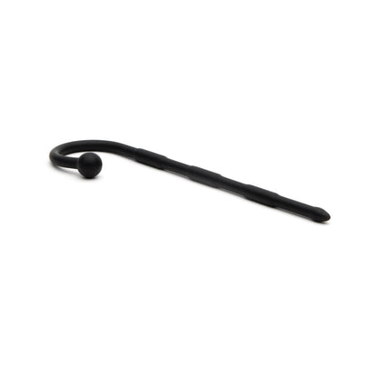 On a white background, the black Sport Fucker Ultra Sound cane by Sport Fucker showcases a curved-back design with a spherical handle and ridged shaft, reminiscent of sound explorers and evokes the precision and quality of medical-grade silicone.