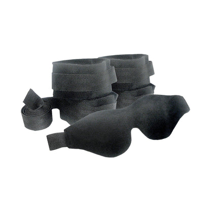 The Sportsheets Beginners Bondage Fantasy Kit from Sportsheets International includes black restraints with adjustable straps and a contoured eye mask, both made from soft materials for secure and comfortable use.
