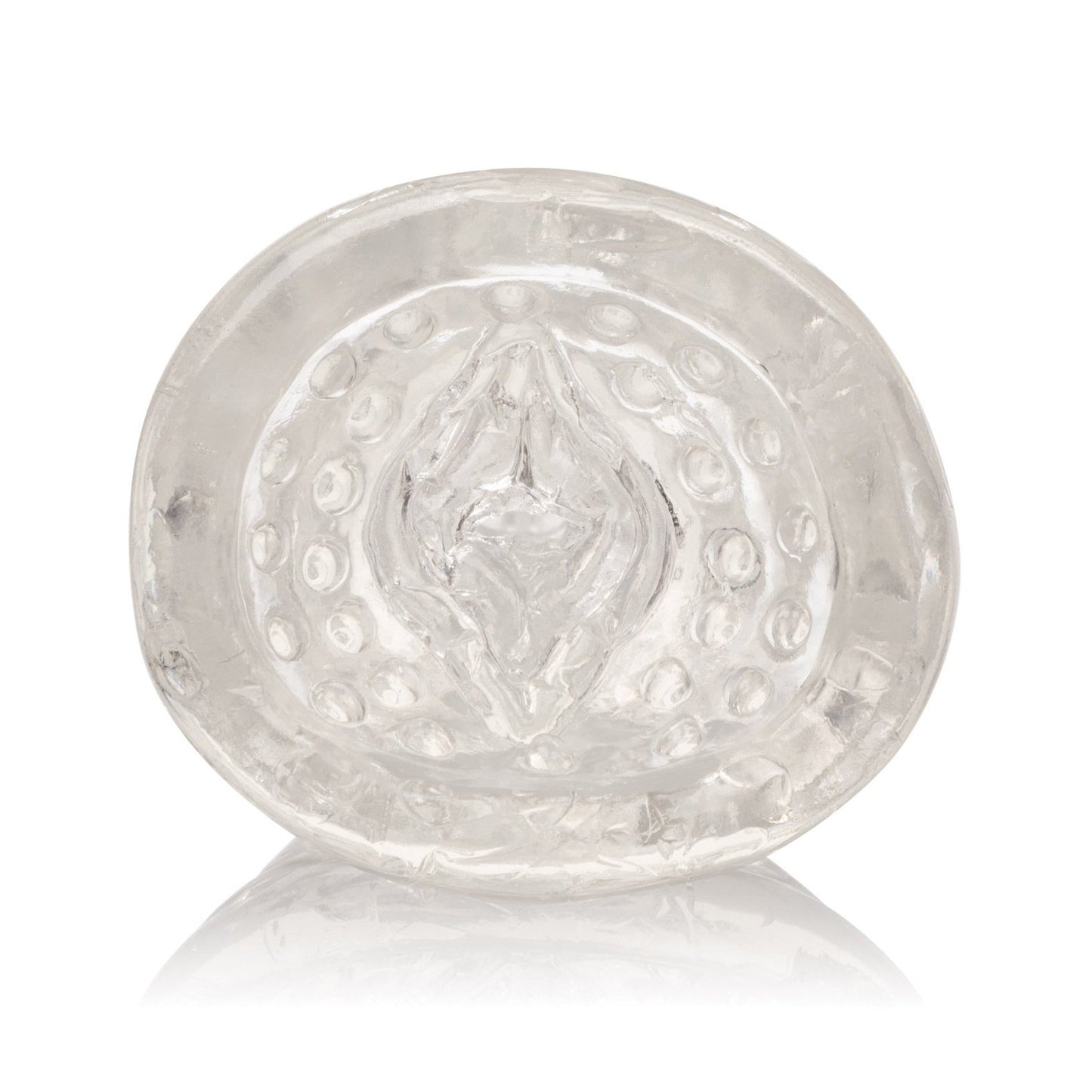 A close-up of a transparent, circular silicone object by California Exotic Novelties features a textured, raised pattern. The sleeve has reflective qualities, creating subtle highlights and shadows reminiscent of the Sue Johanson Head Honcho design.