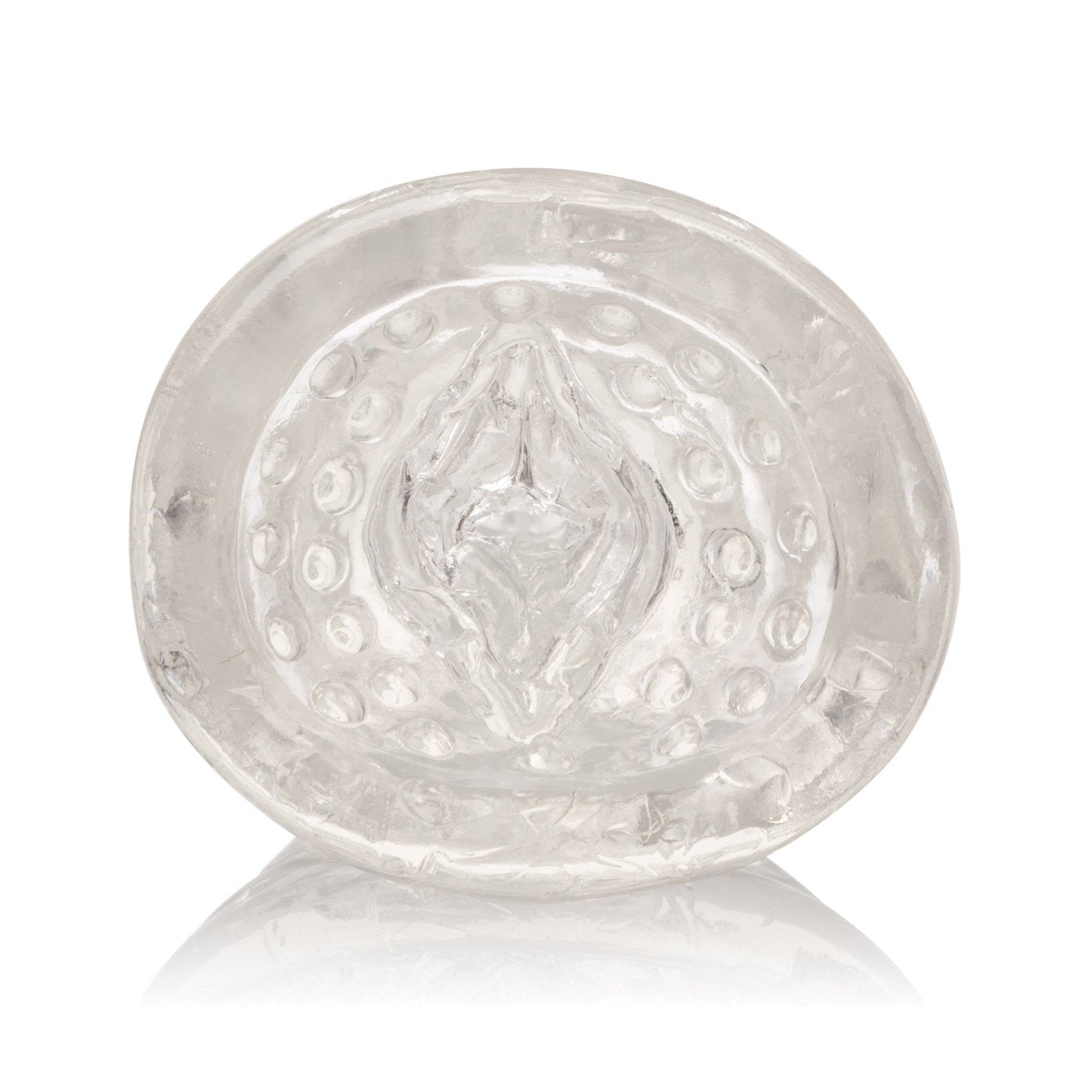 A close-up of a transparent, circular silicone object by California Exotic Novelties features a textured, raised pattern. The sleeve has reflective qualities, creating subtle highlights and shadows reminiscent of the Sue Johanson Head Honcho design.