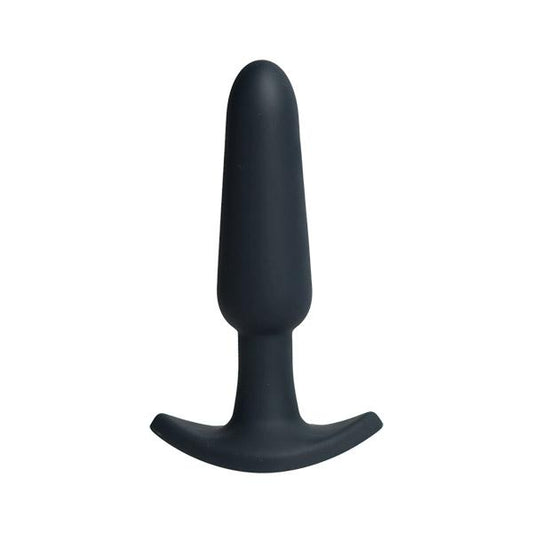 The VeDO Bump Rechargeable Anal Vibe, a black silicone device with a smooth, rounded shape and intense vibration modes, features a flared base making it ideal for beginners.